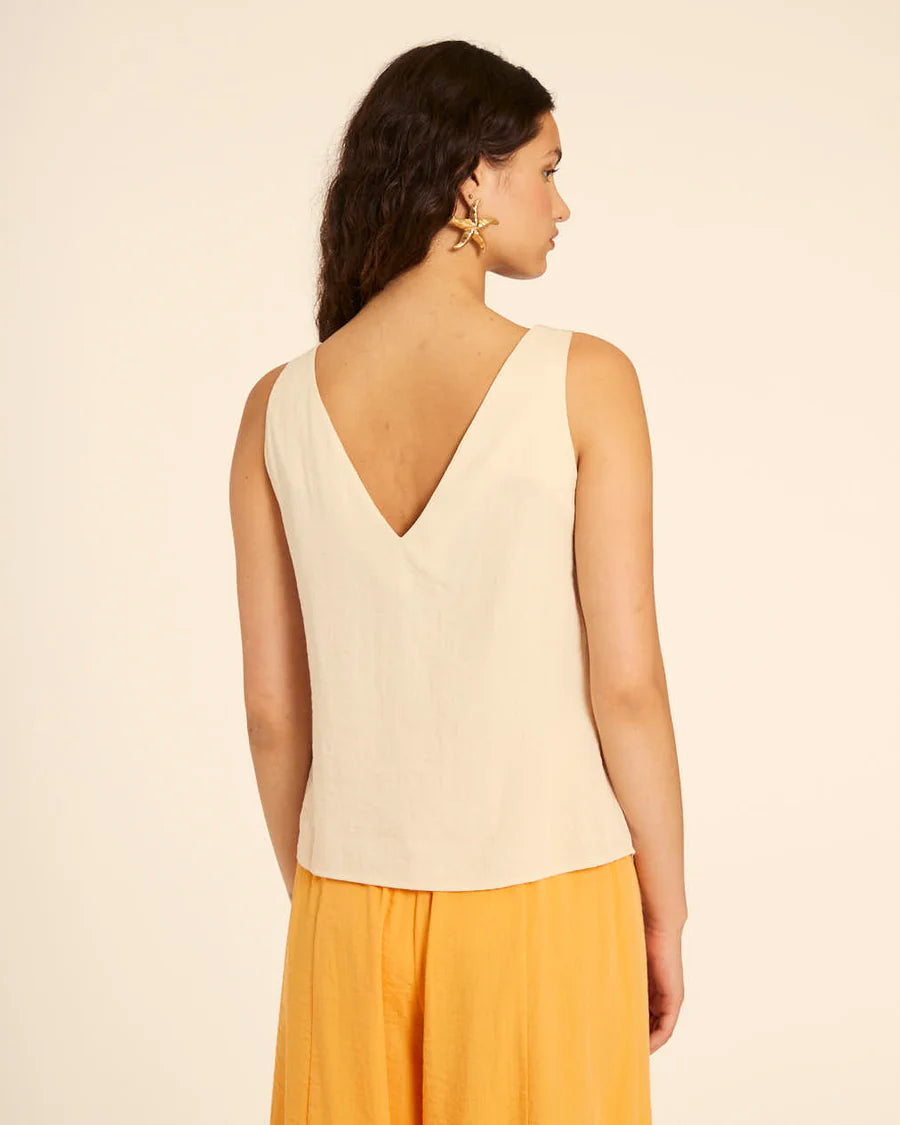 Top con bottoni a stella crema