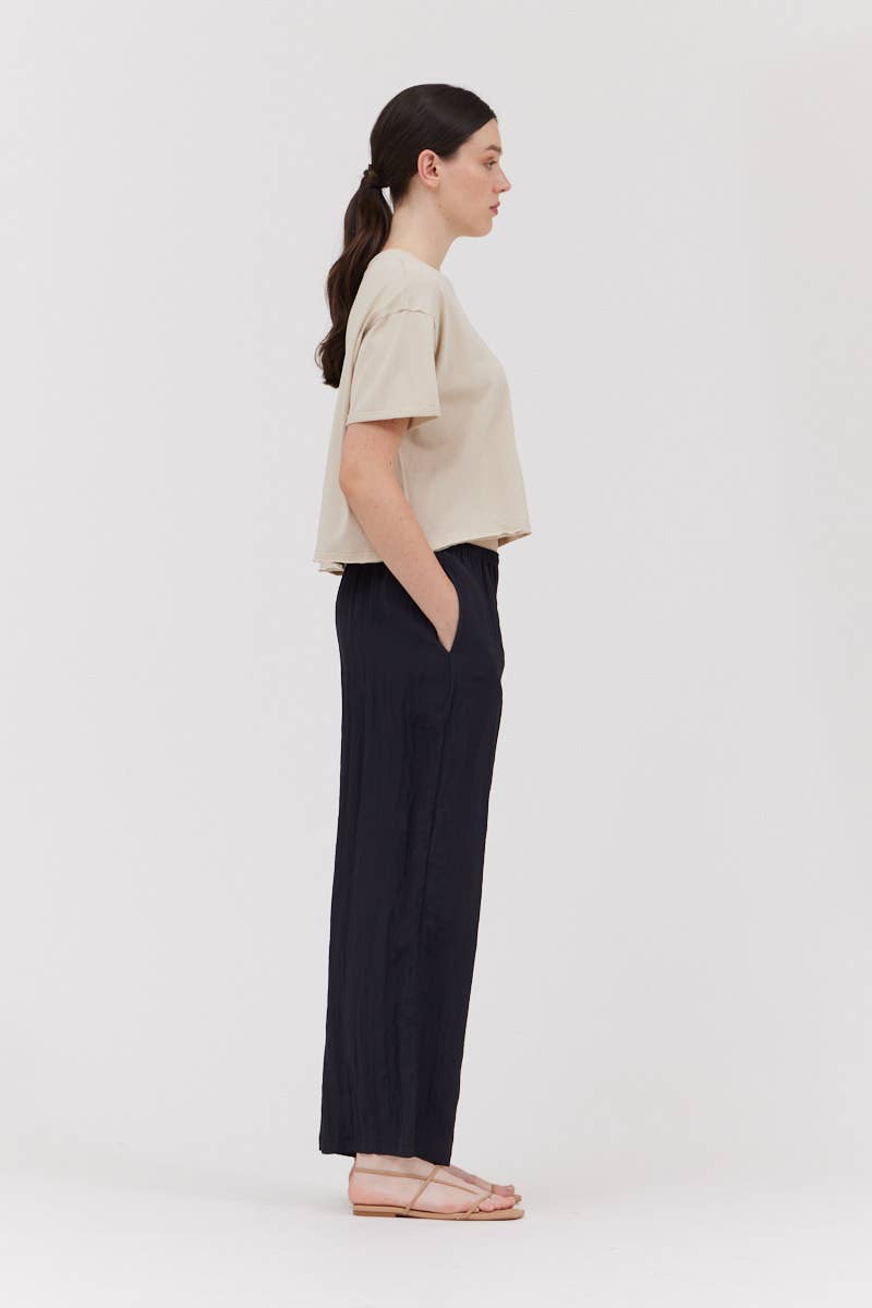 Pantaloni in tessuto stropicciato