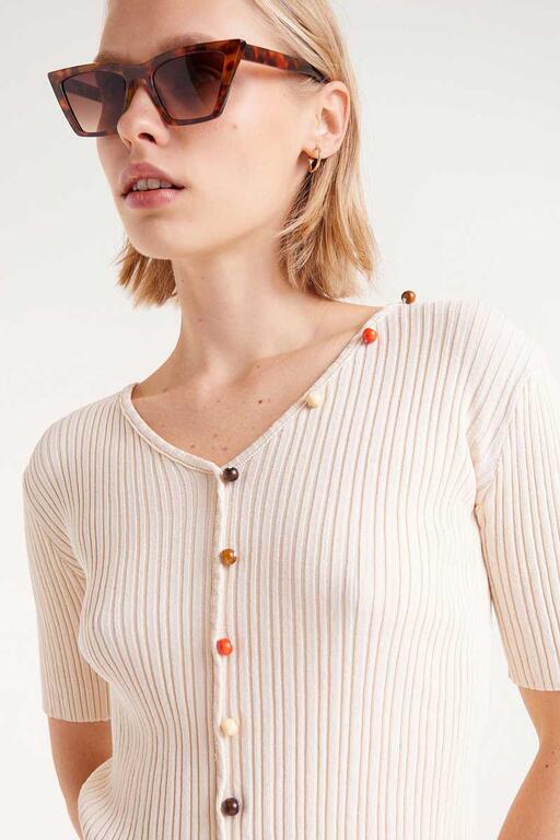 Top a coste con perline beige