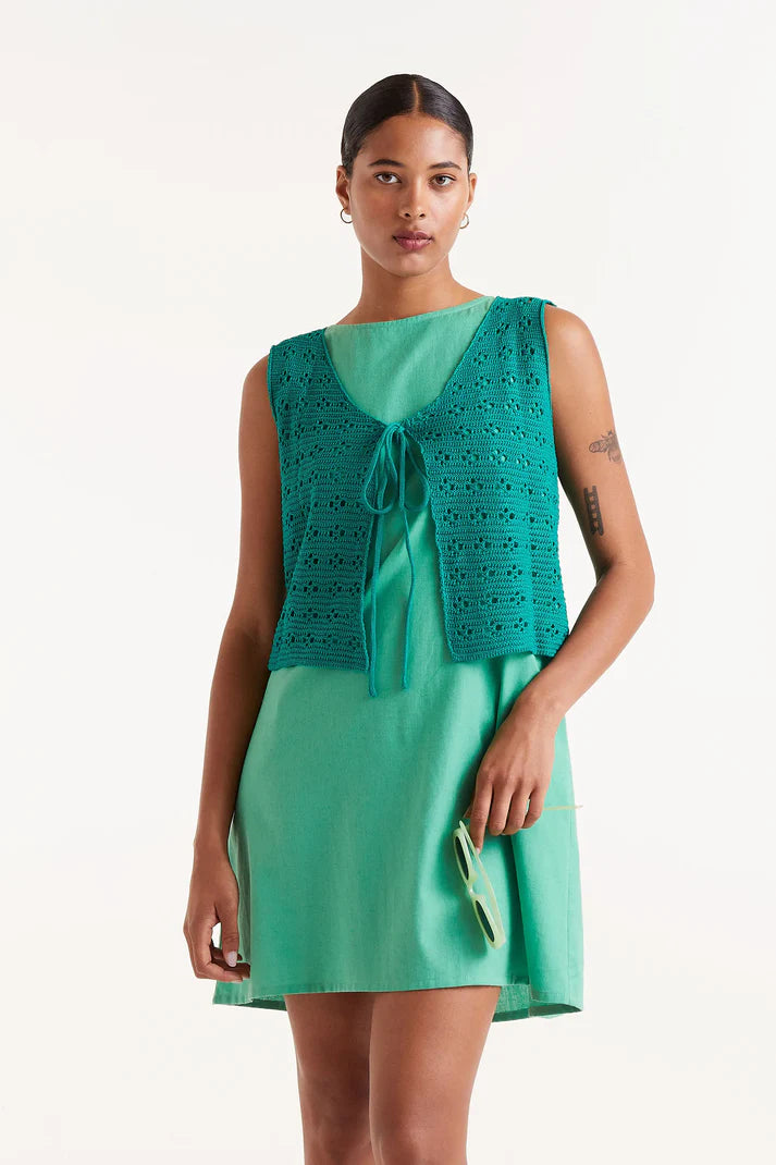 Top con fiocco all'uncinetto verde