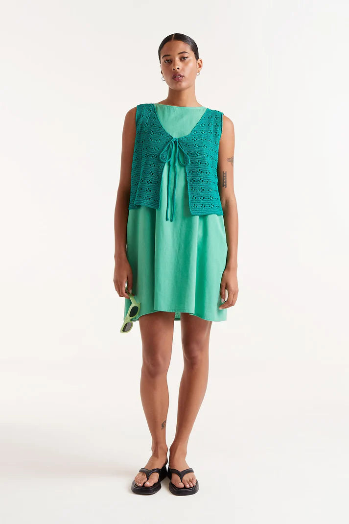 Top con fiocco all'uncinetto verde