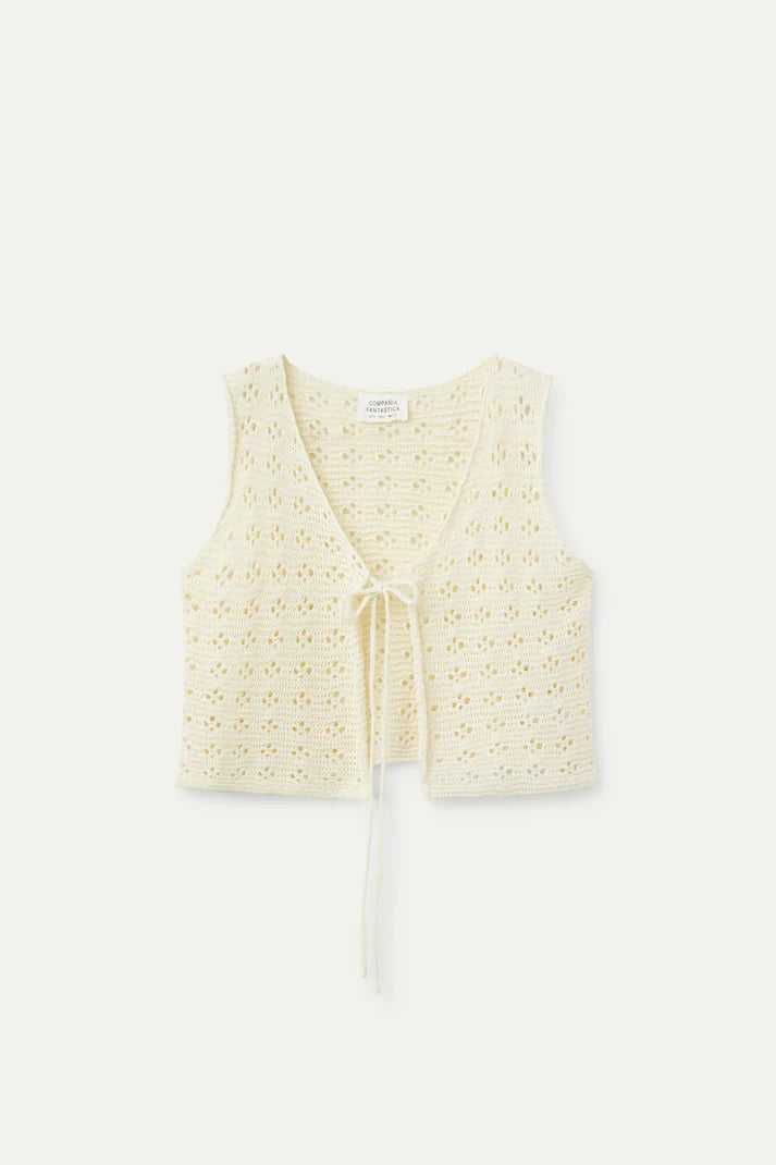 Top con fiocco all'uncinetto bianco
