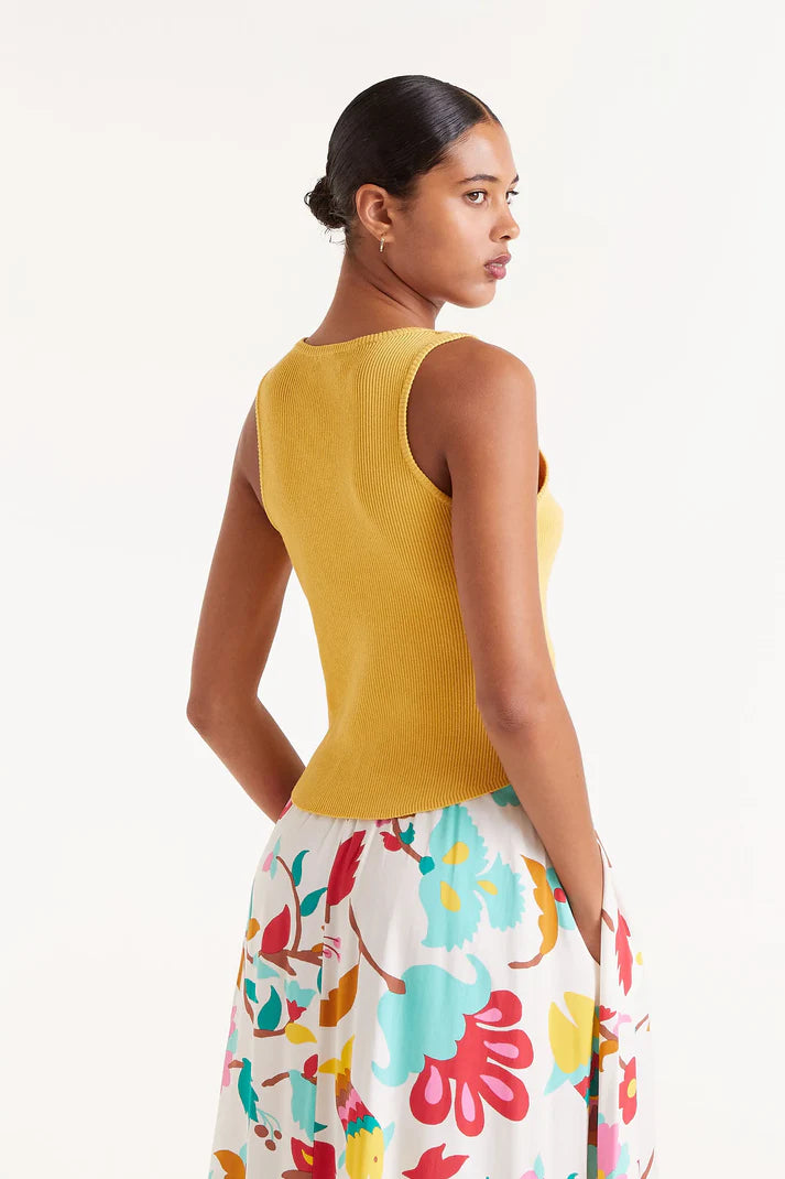 Maglia con bottoni gialli