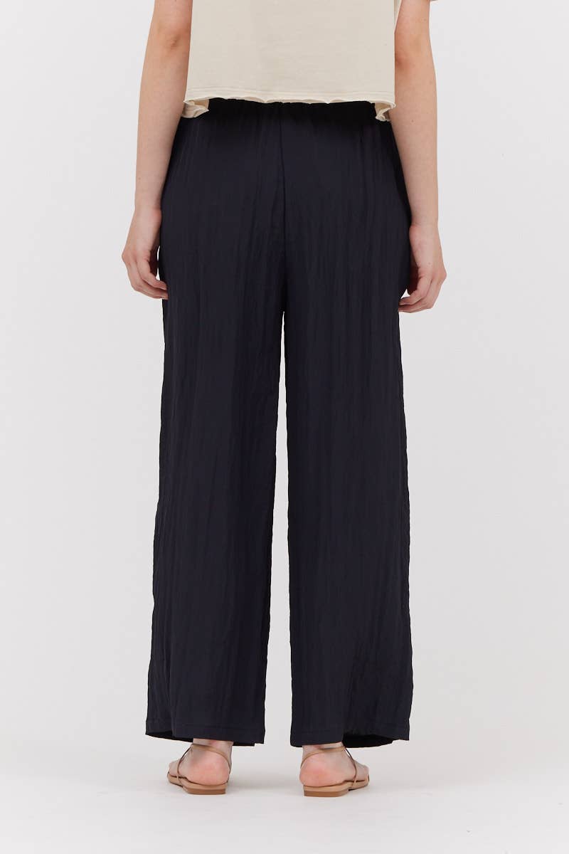 Pantaloni in tessuto stropicciato