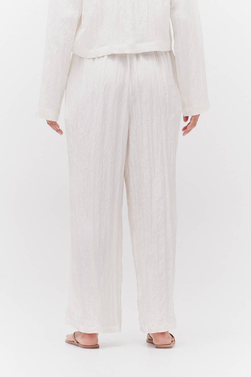 Pantaloni in tessuto stropicciato