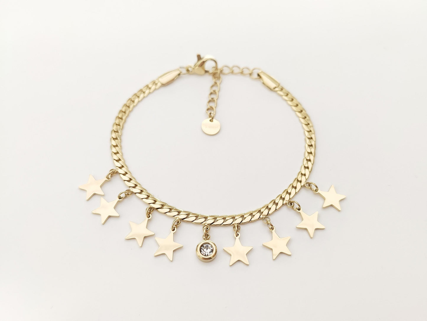 Bracciale regolabile in acciaio con pendagli stelle e strass