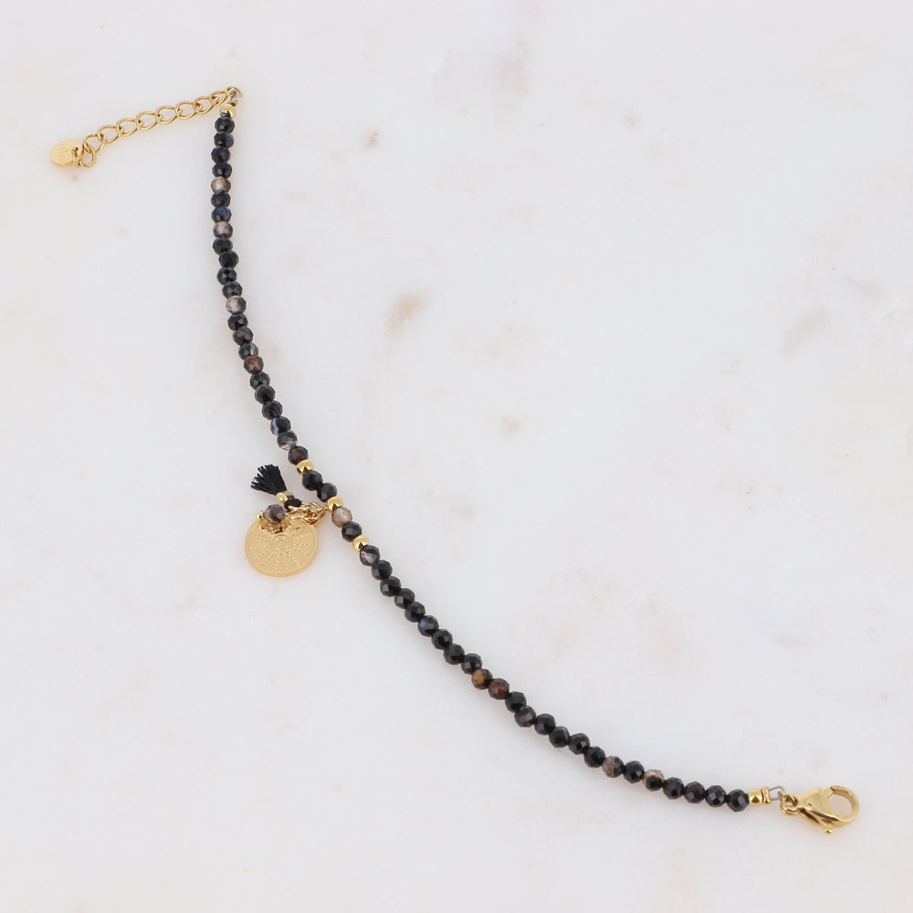 Braccialetto regolabile con perle