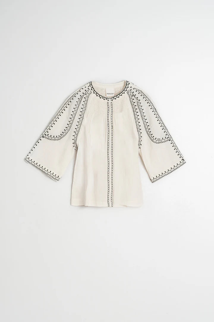 Blusa con ricami