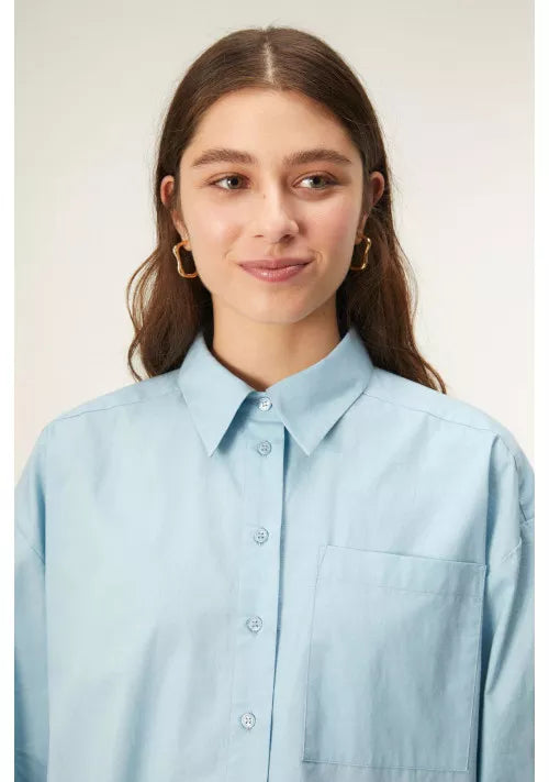 Camicia oversize dalla lunghezza asimmetrica in popeline blu